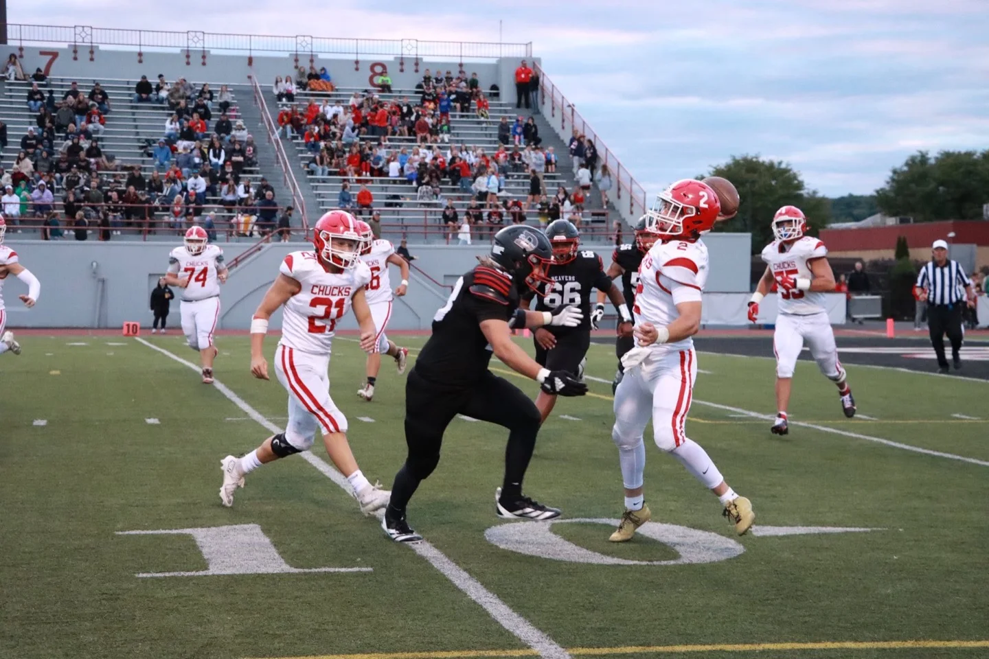 Chucks quarterback throwing a pass during a game